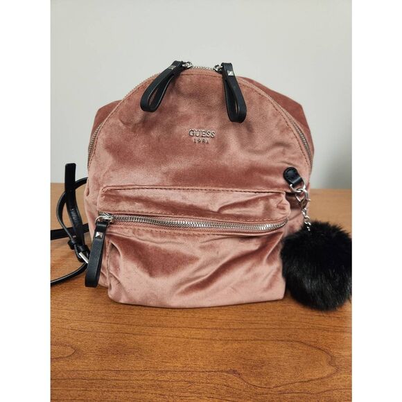 Guess small velvet feel pink backpack with black straps and pom. Measures approx - Picture 1 of 12